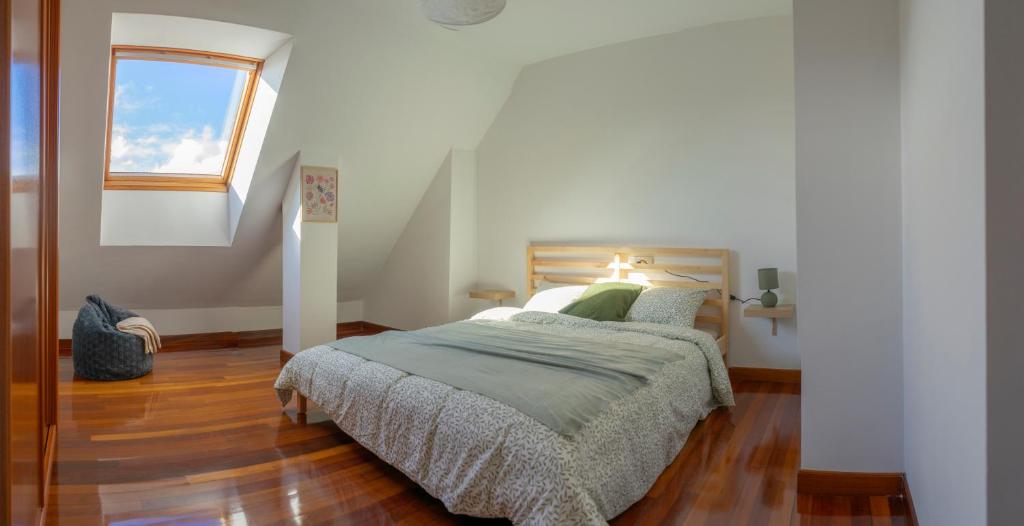 Ένα ή περισσότερα κρεβάτια σε δωμάτιο στο Duplex O Encanto