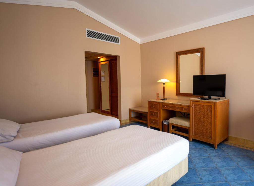 TV a/nebo společenská místnost v ubytování Ecotel Dahab Bay View Resort