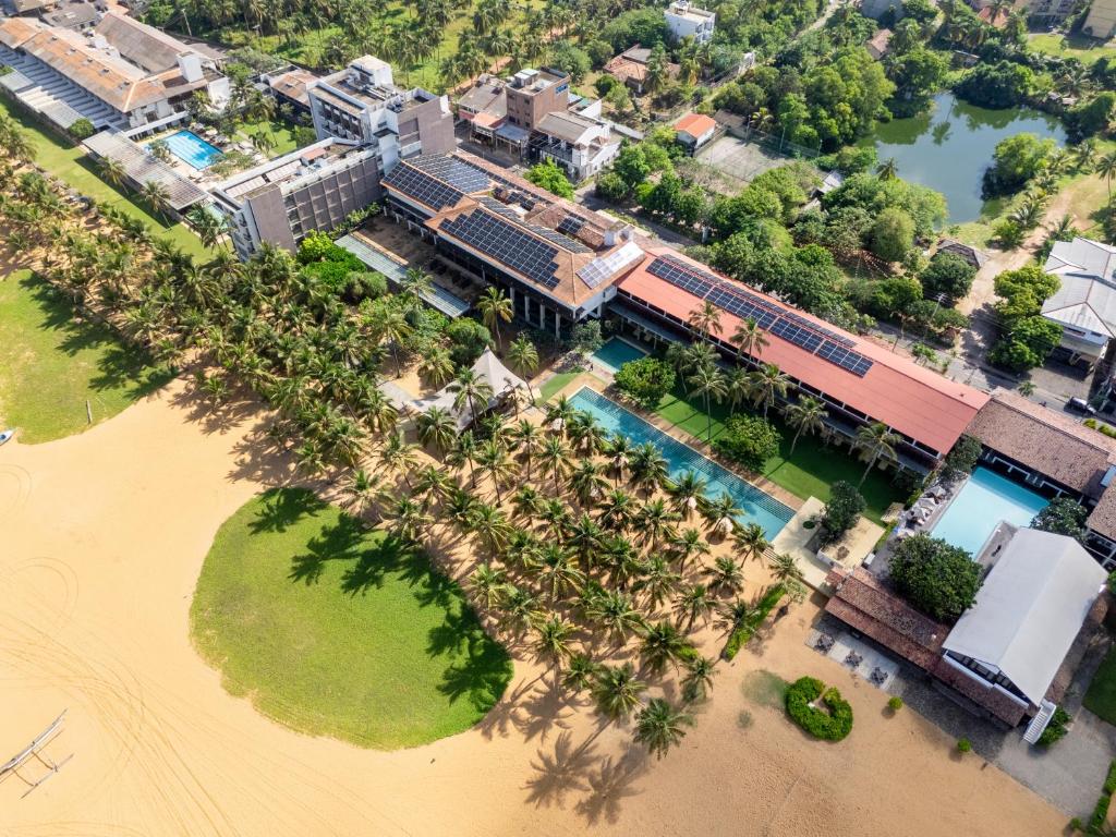 an aerial view of a resort with palm trees at Jetwing Beach in Negombo
