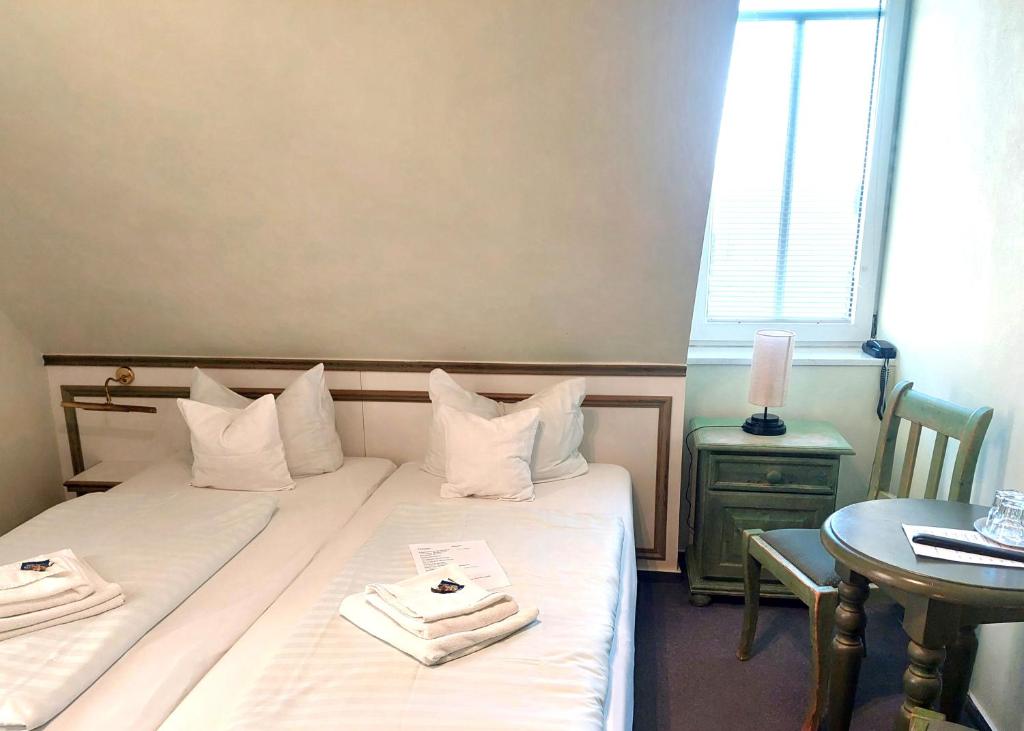 Postel nebo postele na pokoji v ubytování Hotel Villa Weststrand