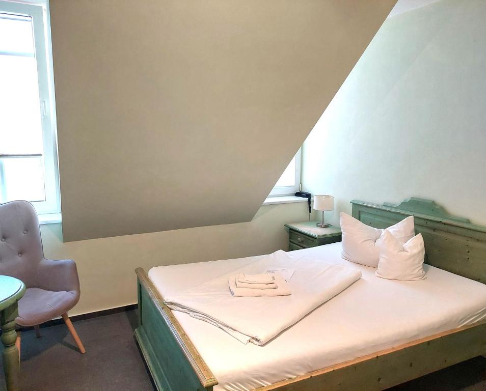 Postel nebo postele na pokoji v ubytování Hotel Villa Weststrand