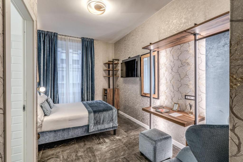 Postel nebo postele na pokoji v ubytování Apollo Boutique Hotel