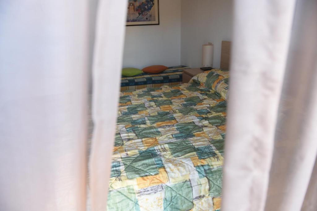 Postel nebo postele na pokoji v ubytování B&B Pizzo Cannicchio