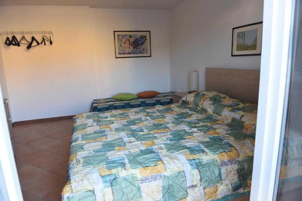 Postel nebo postele na pokoji v ubytování B&B Pizzo Cannicchio