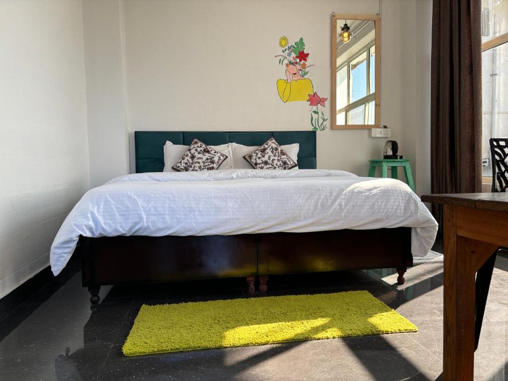 Postel nebo postele na pokoji v ubytování Hill Veu Home Bir Billing