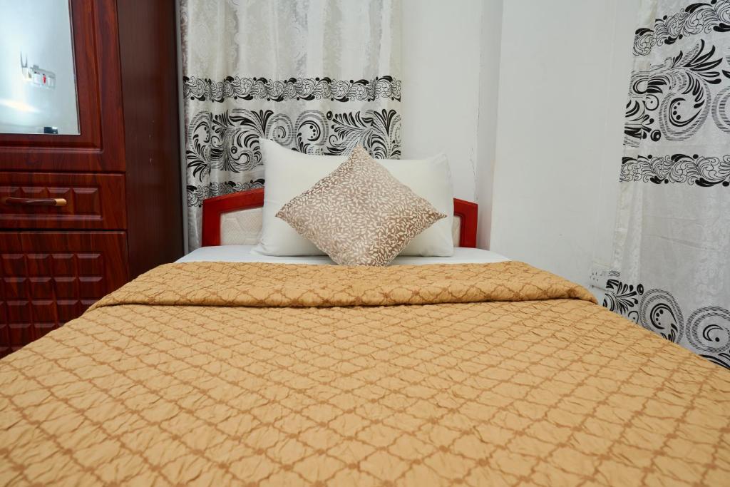 Postel nebo postele na pokoji v ubytování Safari Lodge