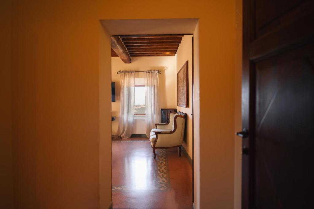 Posezení v ubytování Rocca d'Orcia Suites and Villas