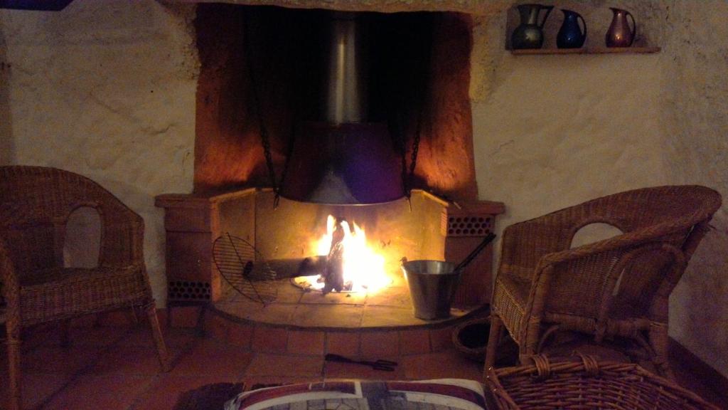Posezení v ubytování Casas Cueva y Cortijo La Tala en Guadix