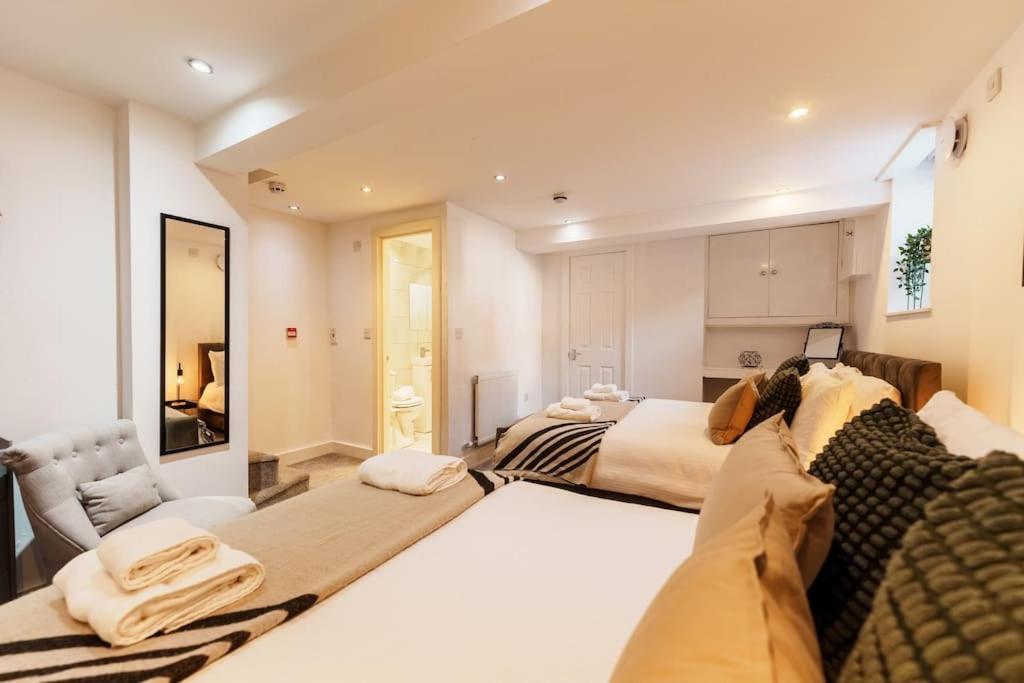 Enjoy Leeds at 4BR House - Near City Centreにあるベッド