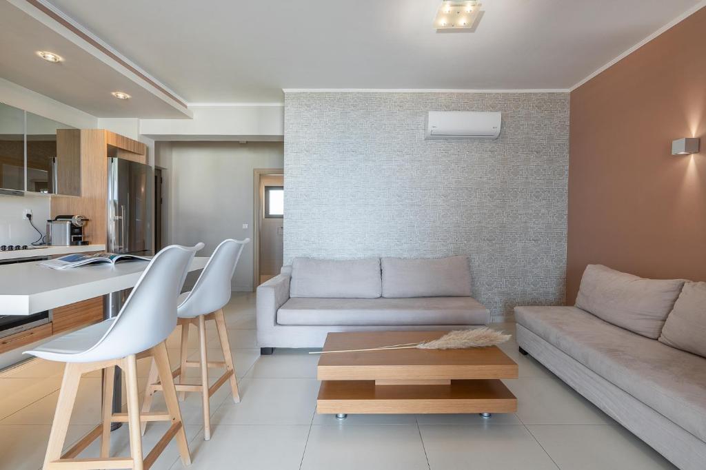 Posezení v ubytování Kymothoe Elite Suites