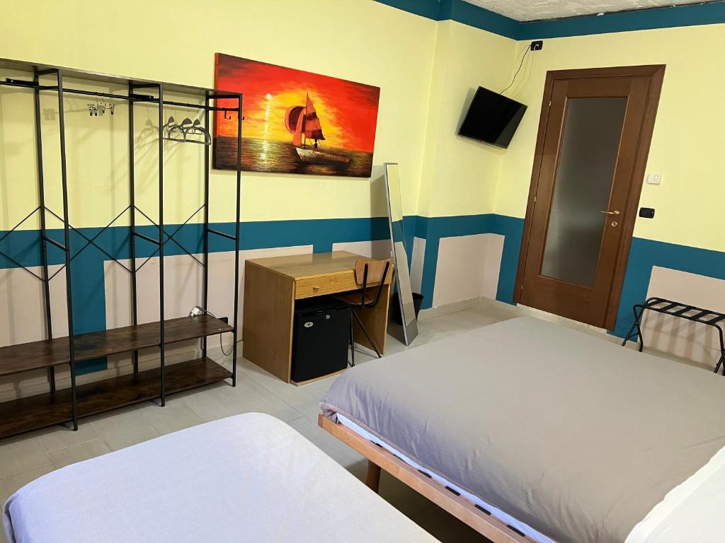 Postel nebo postele na pokoji v ubytování Hotel Persico