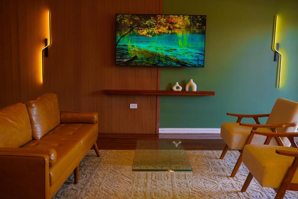 TV a/nebo společenská místnost v ubytování Parc Rayne