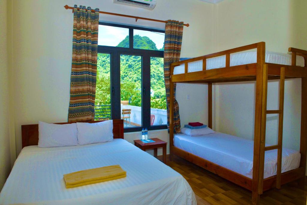 Postel nebo postele na pokoji v ubytování YoLo Pool Bar Villas & Garden Restaurant