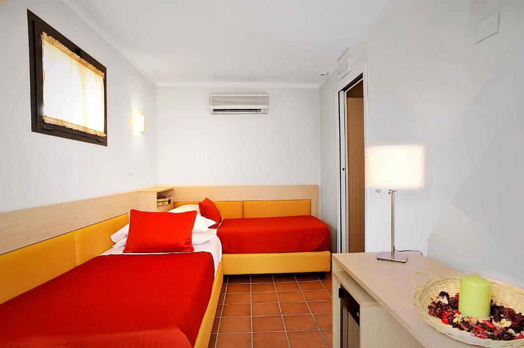 Postel nebo postele na pokoji v ubytování Hotel Scott House