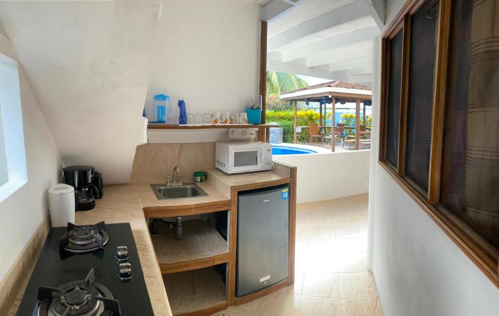 Kuchyň nebo kuchyňský kout v ubytování Casa Aba Matapalo