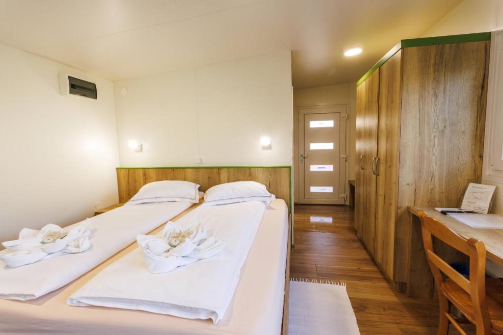 Postel nebo postele na pokoji v ubytování Mobile House Vegov hram