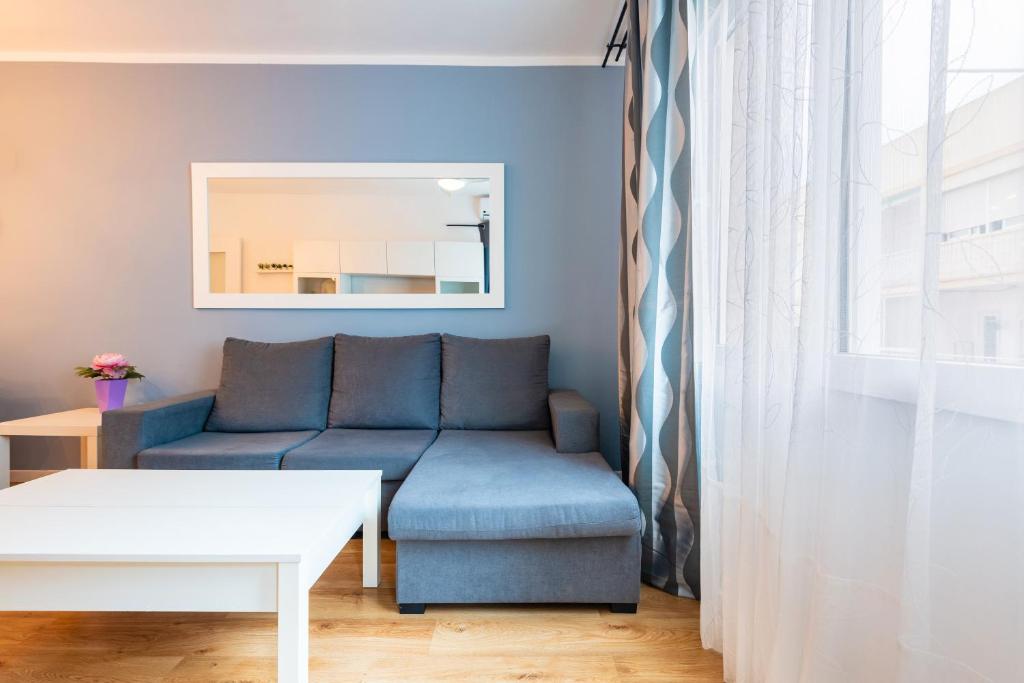 A seating area at Apartamento Caracola
