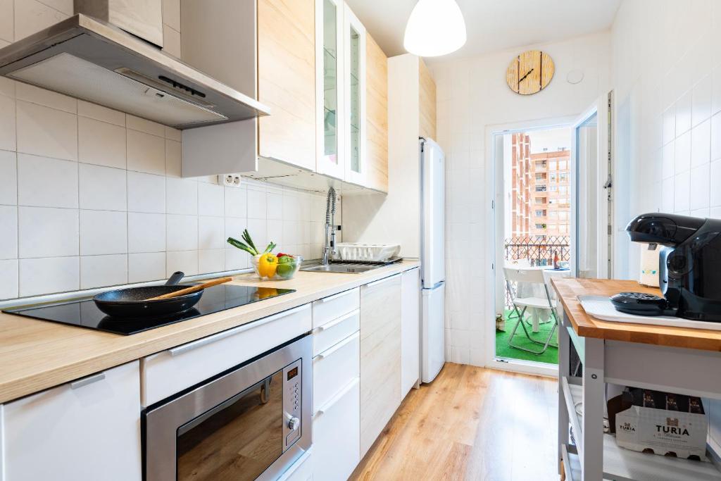 A kitchen or kitchenette at Apartamento Caracola