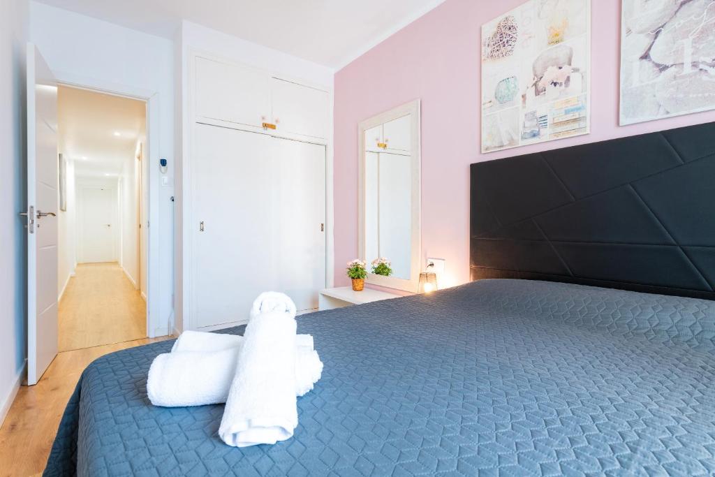 A bed or beds in a room at Apartamento Caracola