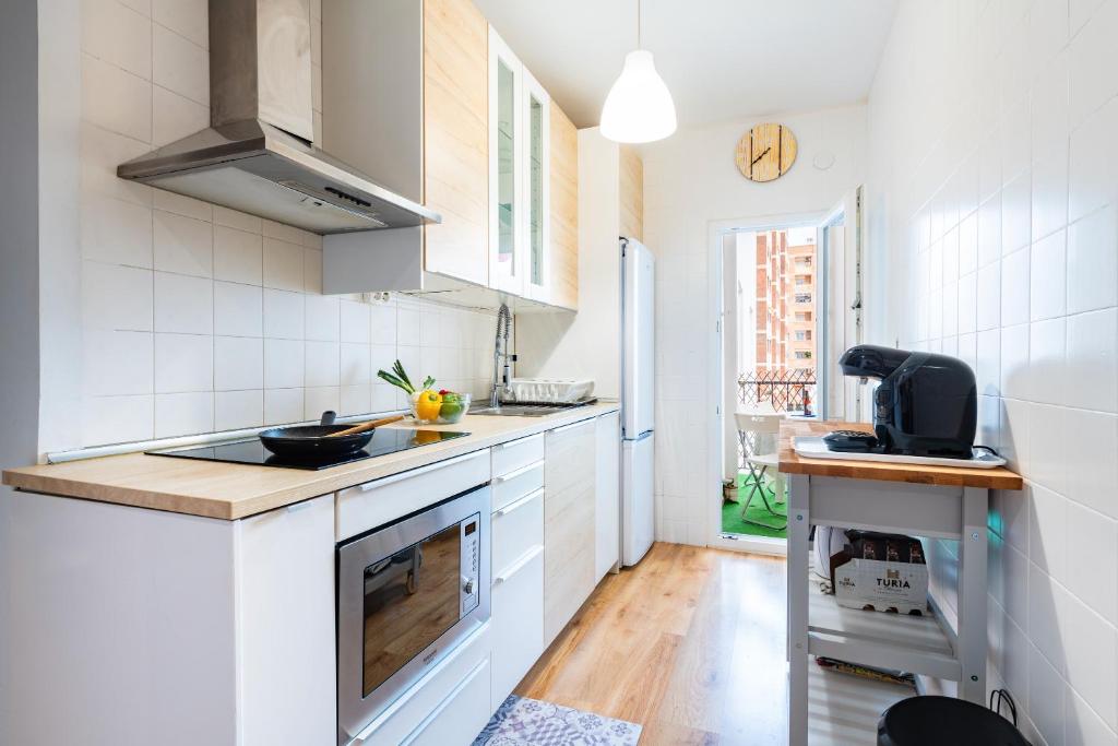 A kitchen or kitchenette at Apartamento Caracola