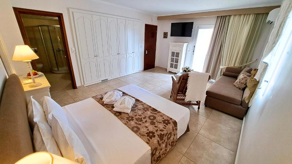 Postel nebo postele na pokoji v ubytování Hotel Astron Princess