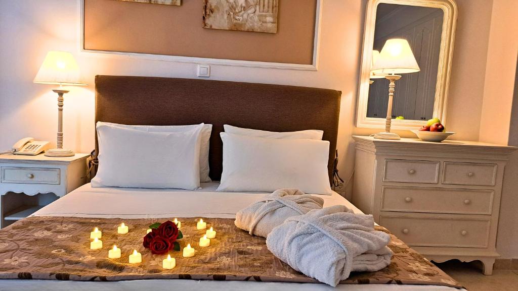 Postel nebo postele na pokoji v ubytování Hotel Astron Princess