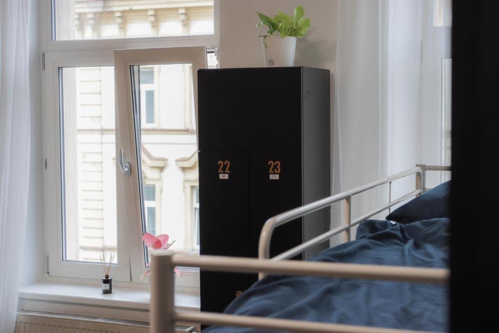 Postel nebo postele na pokoji v ubytování IN hostel Prague
