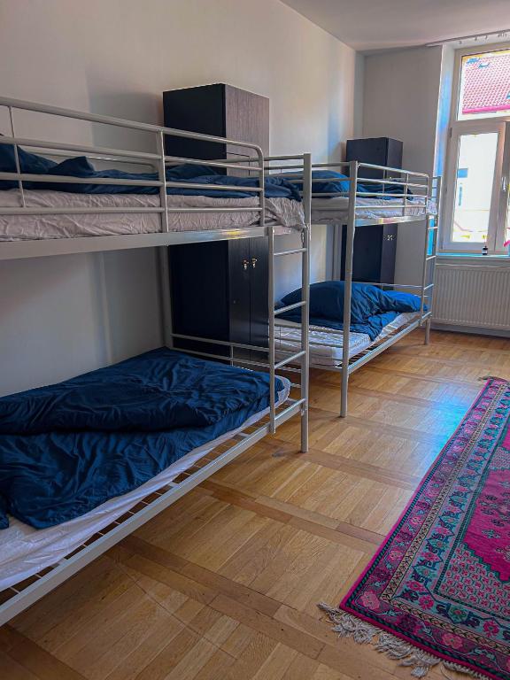 Postel nebo postele na pokoji v ubytování IN hostel Prague