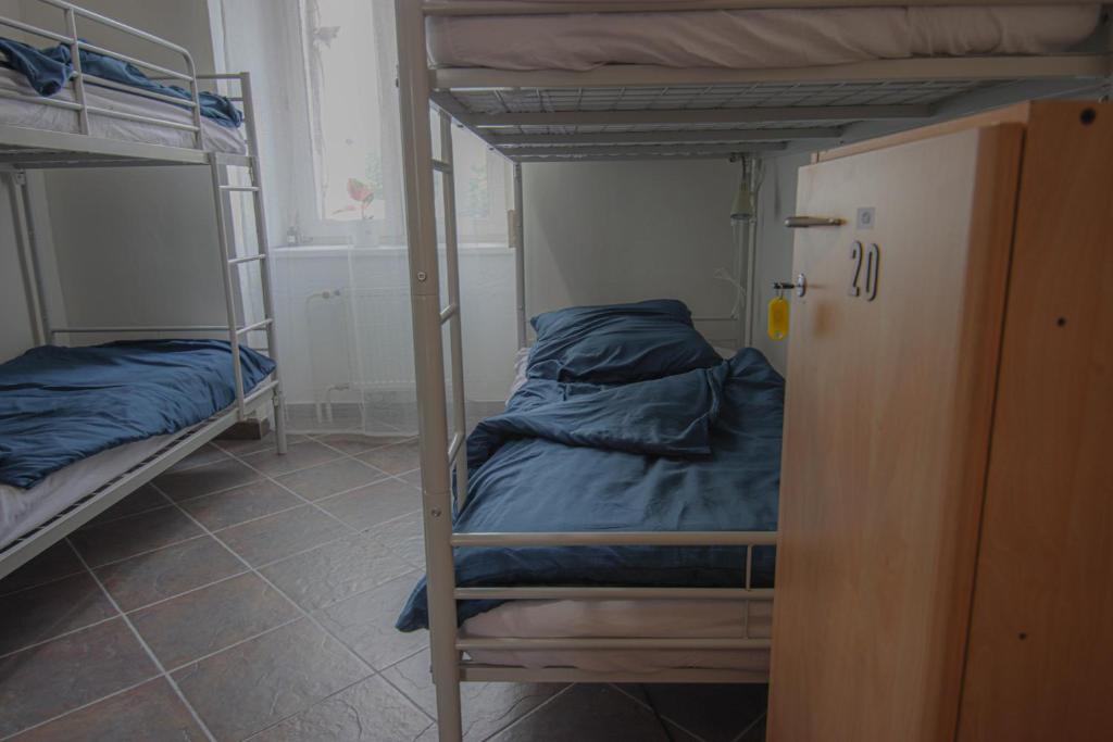 Postel nebo postele na pokoji v ubytování IN hostel Prague