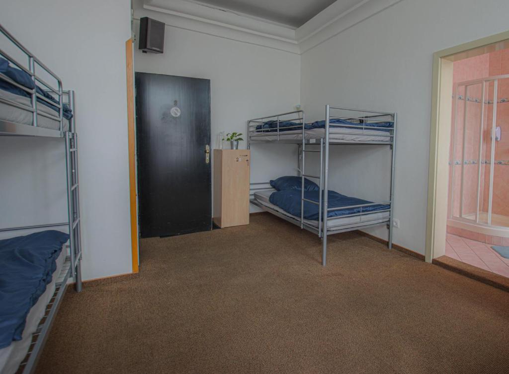 Postel nebo postele na pokoji v ubytování IN hostel Prague