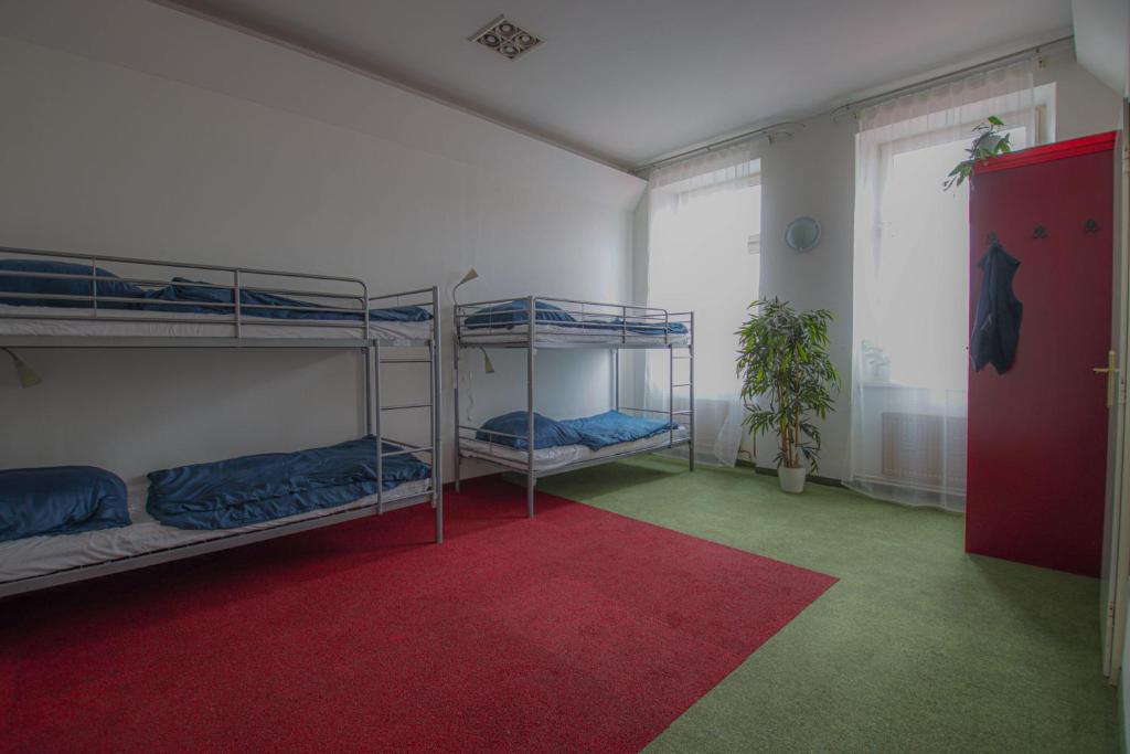 Postel nebo postele na pokoji v ubytování IN hostel Prague