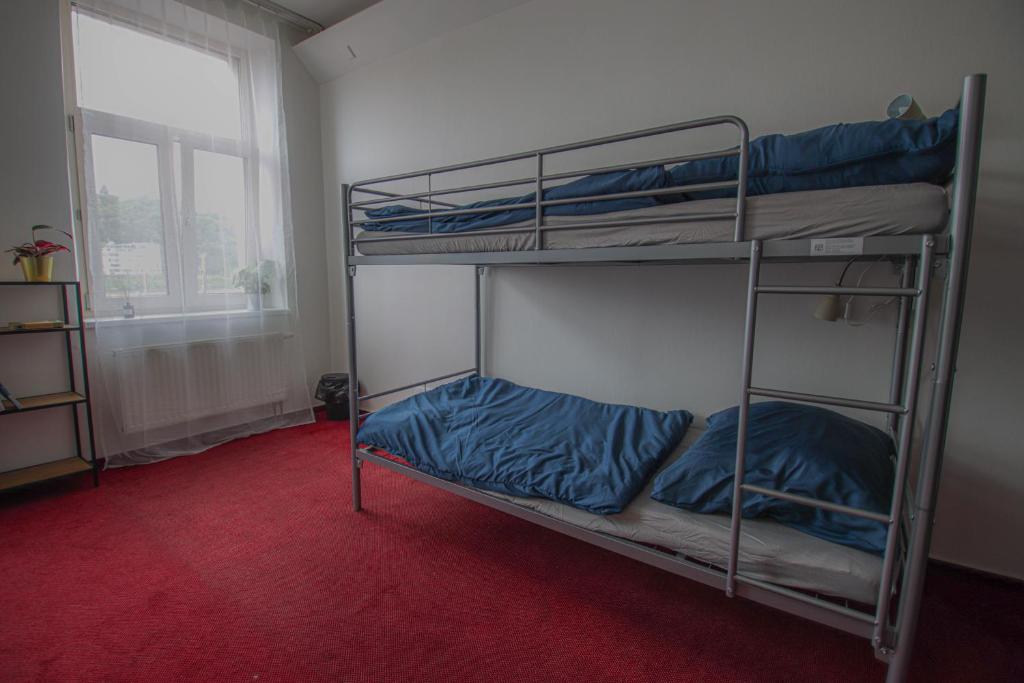 Postel nebo postele na pokoji v ubytování IN hostel Prague