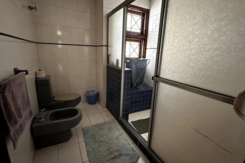 Koupelna v ubytování Casa con chimenea en Lambaré