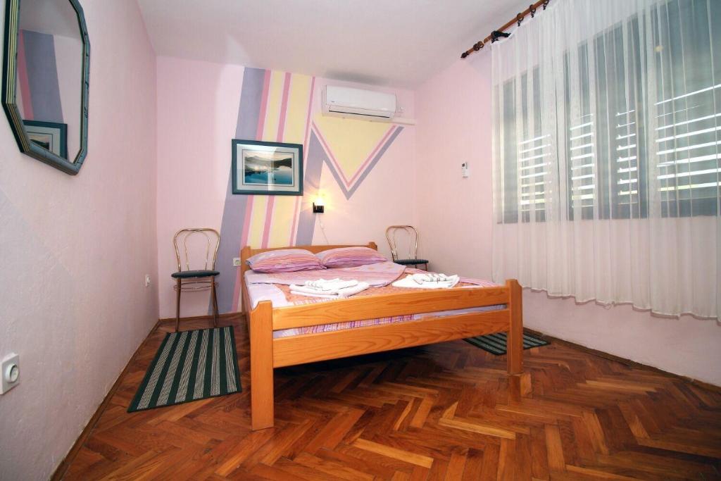 Postel nebo postele na pokoji v ubytování House Ante