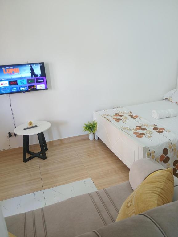 Postel nebo postele na pokoji v ubytování Reyna Apartments