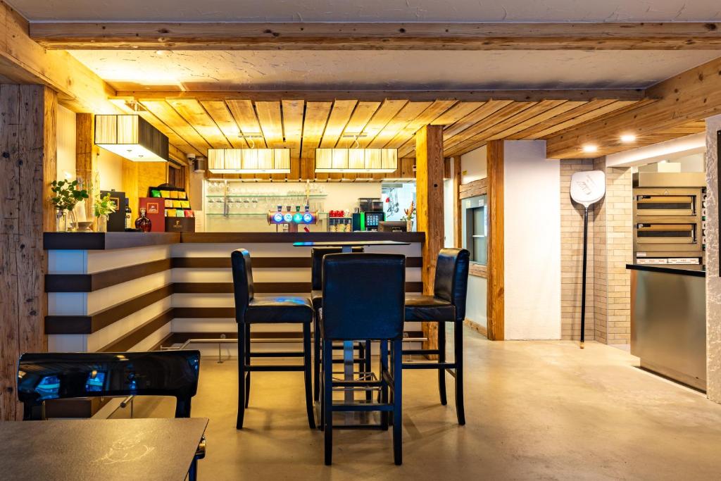 Kuchyň nebo kuchyňský kout v ubytování Hotel Restaurant Simplon