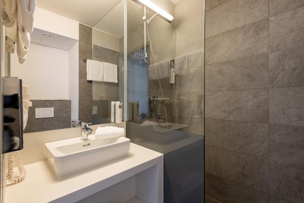 Koupelna v ubytování Hwest Hotel