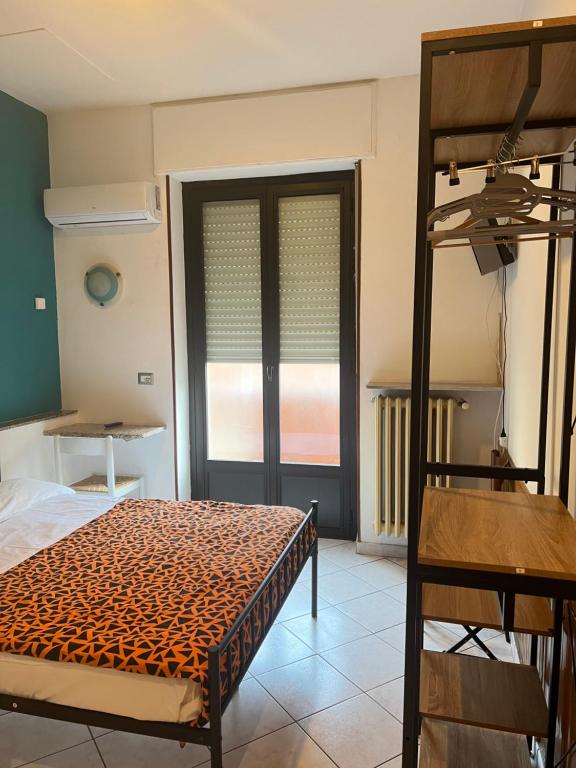 Postel nebo postele na pokoji v ubytování Hotel Persico