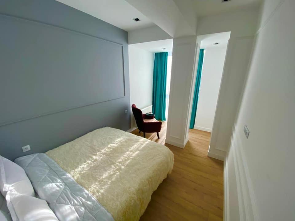Postel nebo postele na pokoji v ubytování winter house GUDAURI