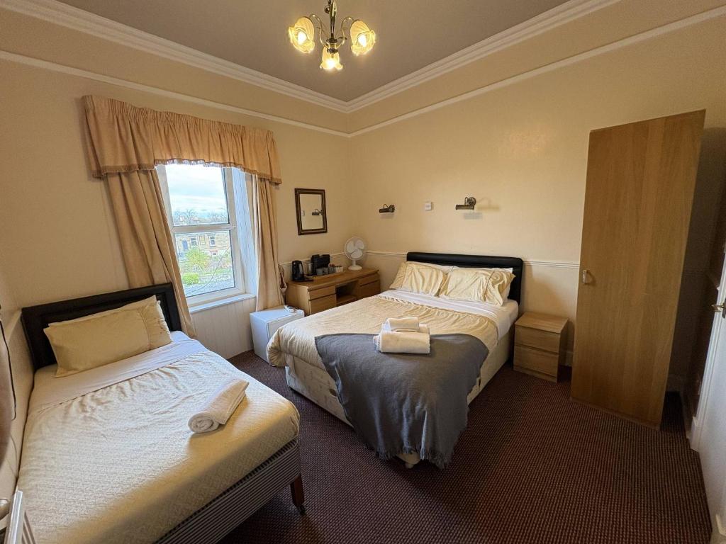 Postel nebo postele na pokoji v ubytování Brae Guest House