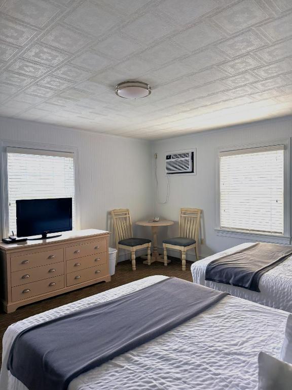 Postel nebo postele na pokoji v ubytování Francis Scott Key Family Resort