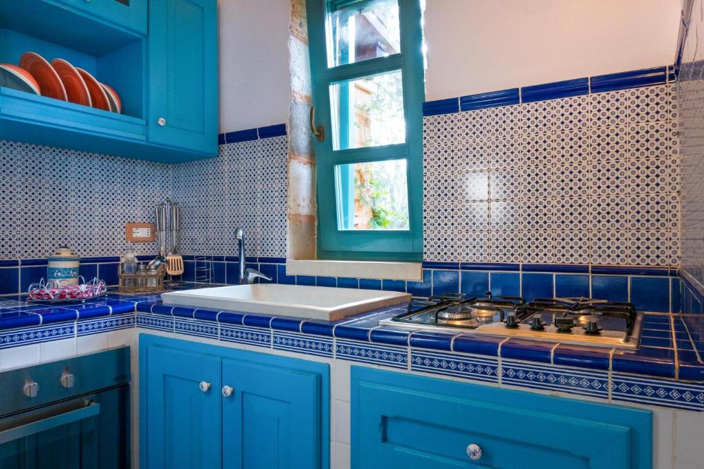 Kuchyň nebo kuchyňský kout v ubytování Villa Astrea