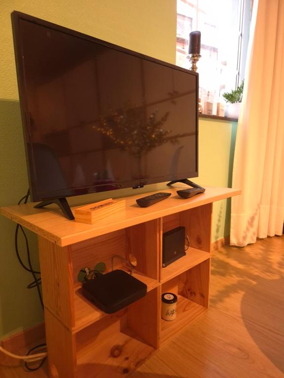 TV a/nebo společenská místnost v ubytování Bulle D'eau