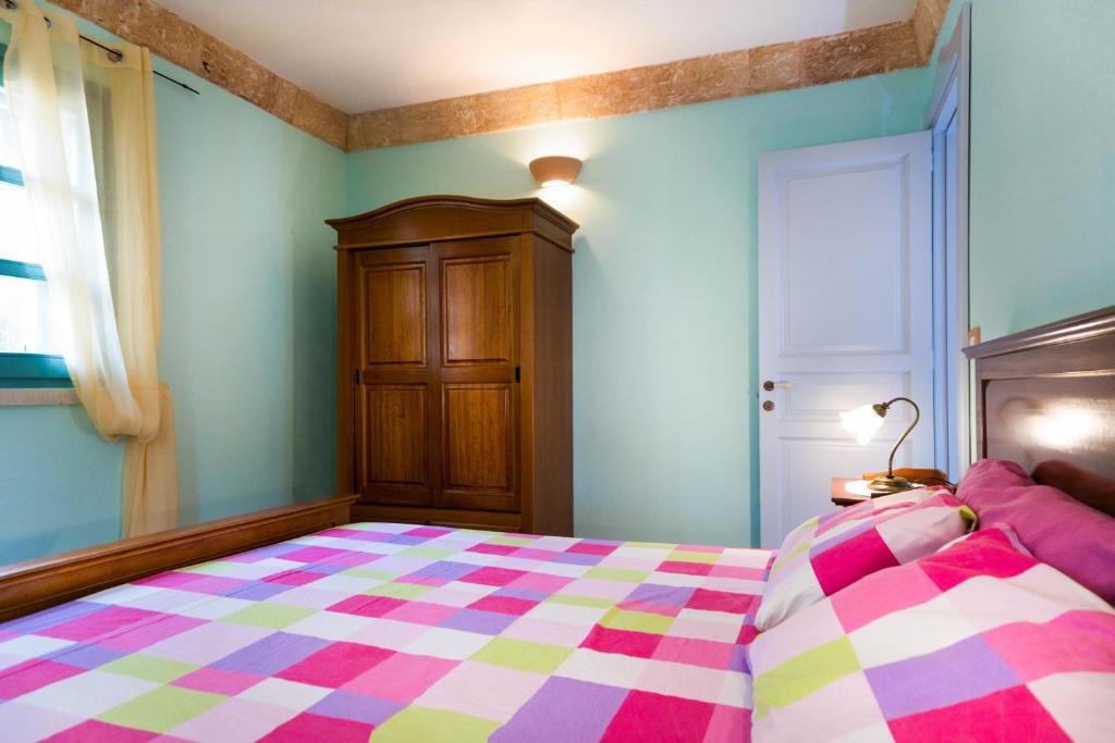 Postel nebo postele na pokoji v ubytování Villa Astrea