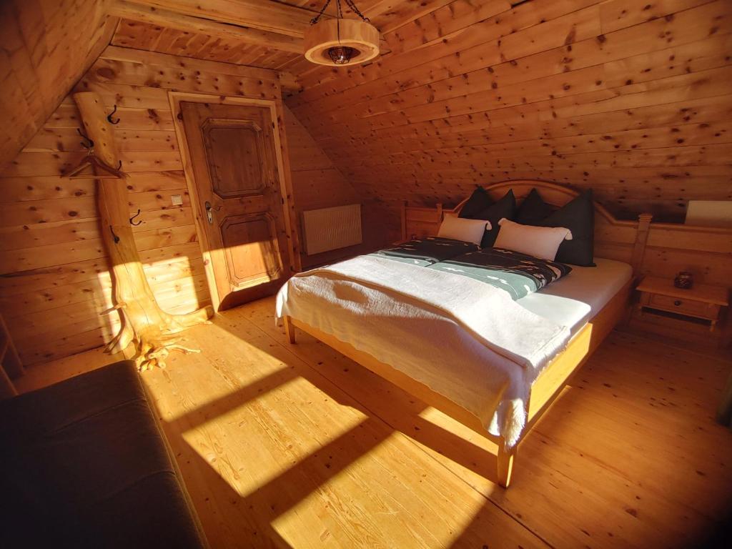 Postel nebo postele na pokoji v ubytování Kerschbaumer Chalet