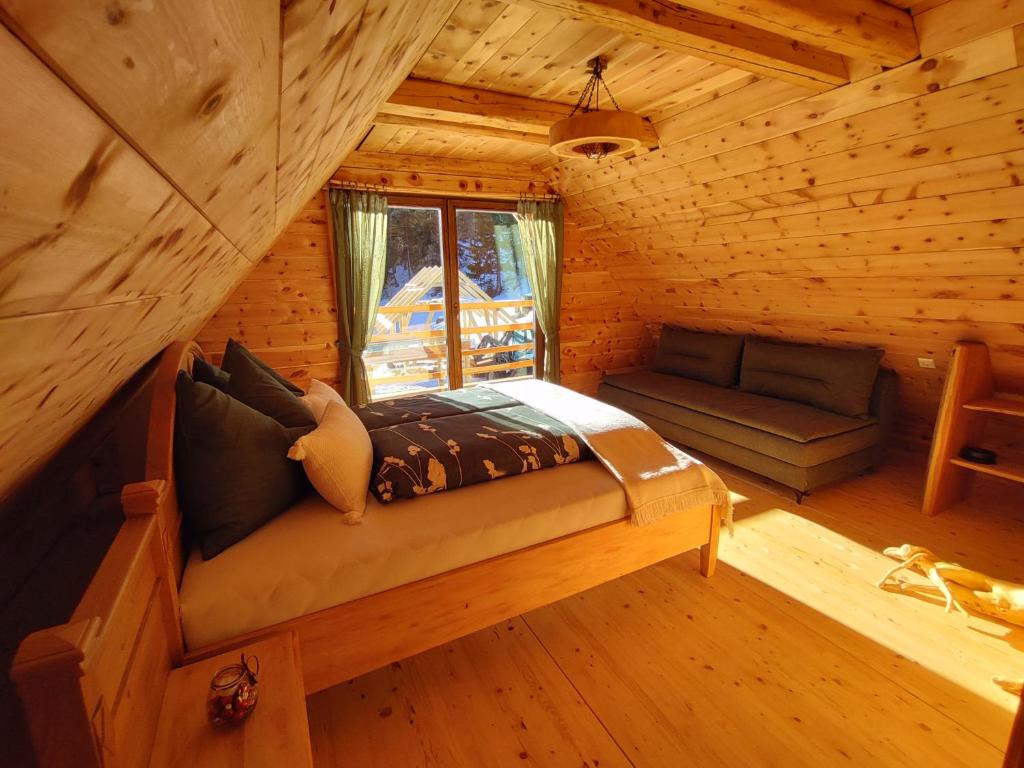 Postel nebo postele na pokoji v ubytování Kerschbaumer Chalet