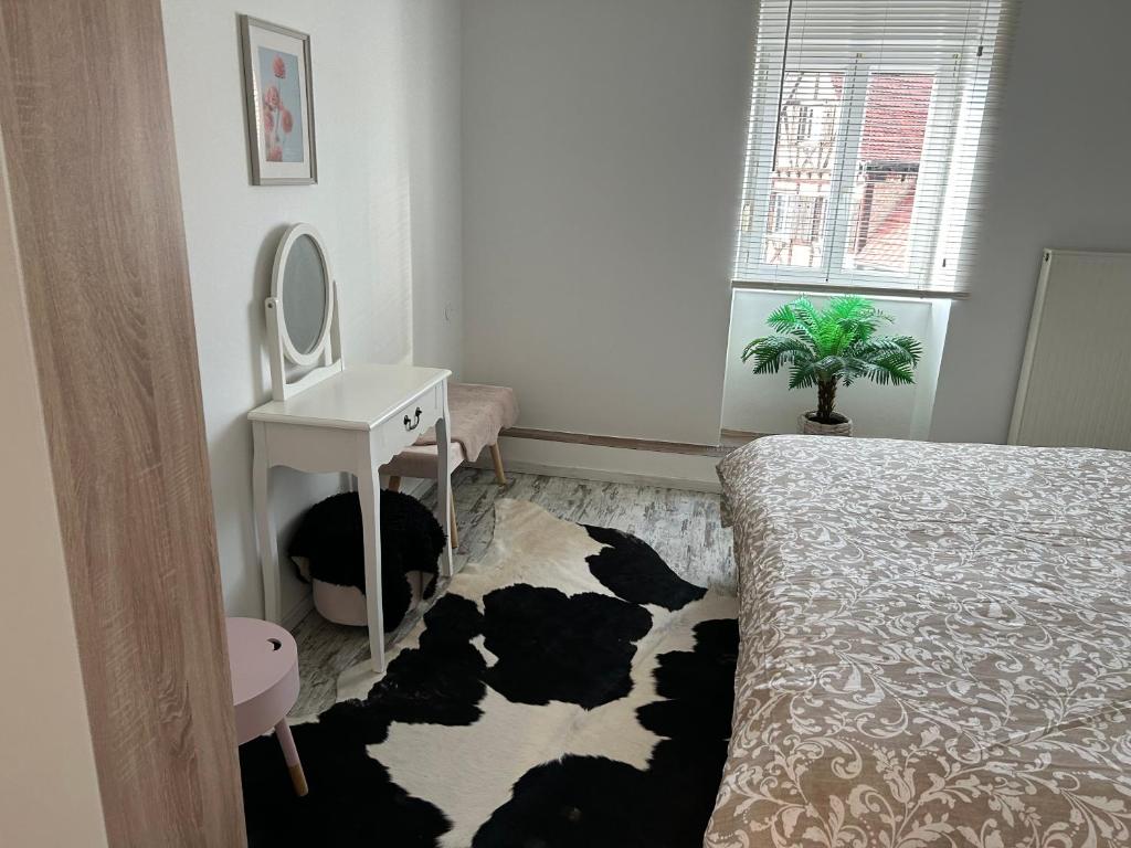 Postel nebo postele na pokoji v ubytování Appart Chez willi