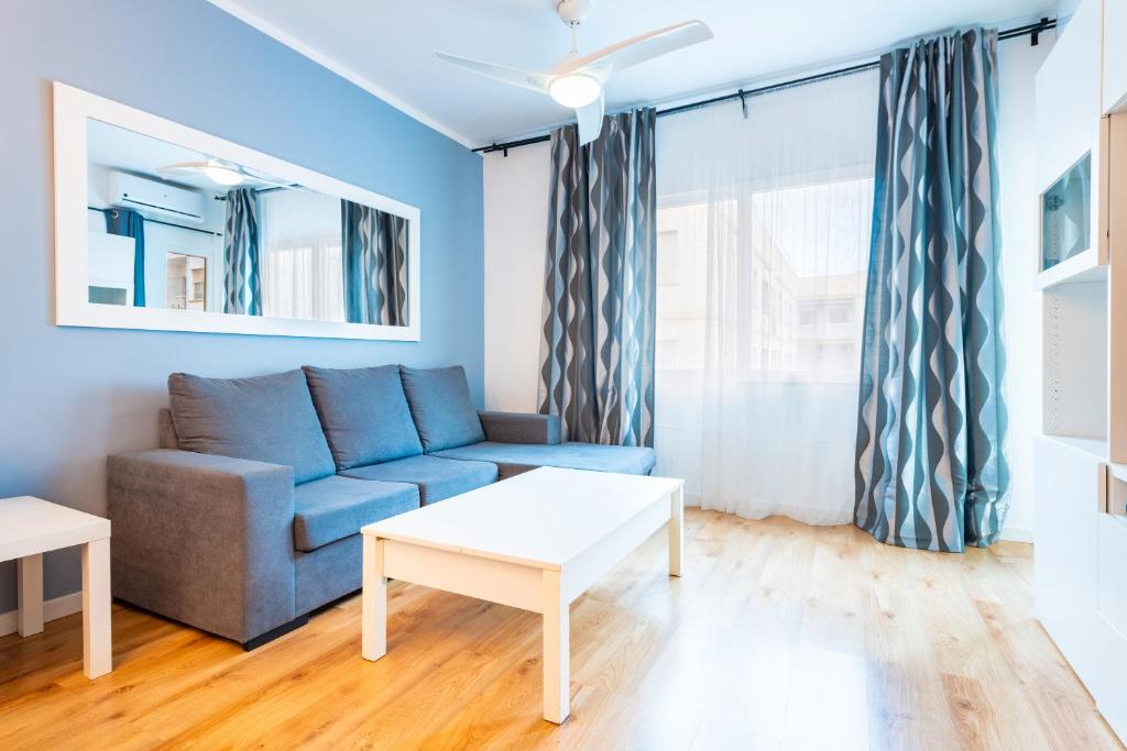 A seating area at Apartamento Caracola