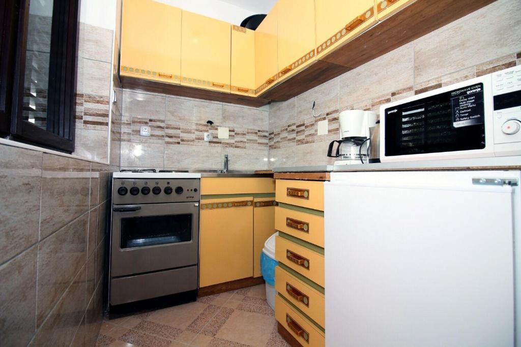 Kuchyň nebo kuchyňský kout v ubytování House Ante
