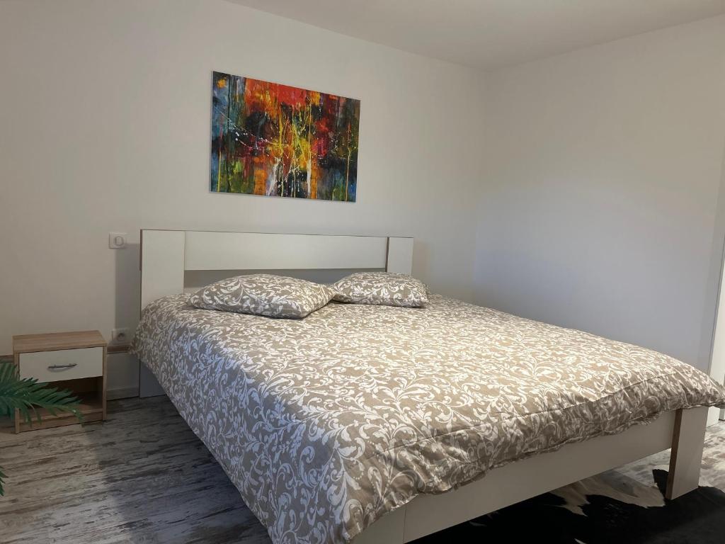 Postel nebo postele na pokoji v ubytování Appart Chez willi
